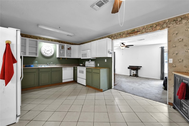 kitchen with ceiling fan, white cabinets, green cabinetry, and white appliances