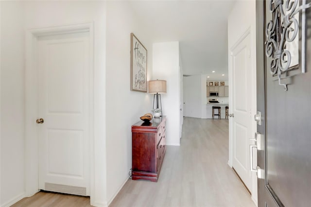 corridor featuring light wood-type flooring