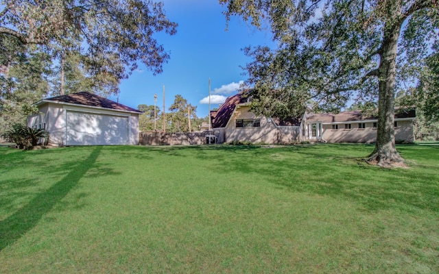 view of yard featuring a garage