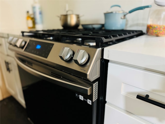 details featuring stainless steel gas range oven