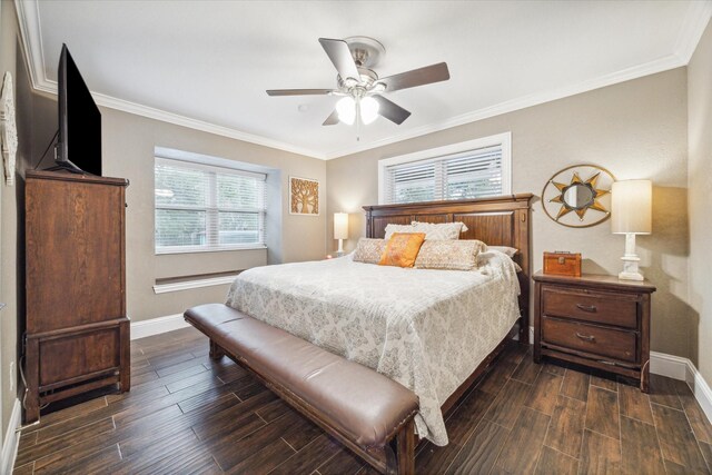 bedroom featuring ceiling fan, dark wood-type flooring, and ornamental molding