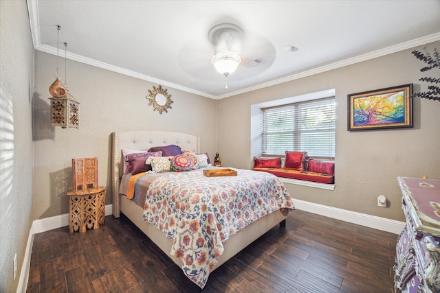 bedroom with crown molding, baseboards, and dark wood-style flooring