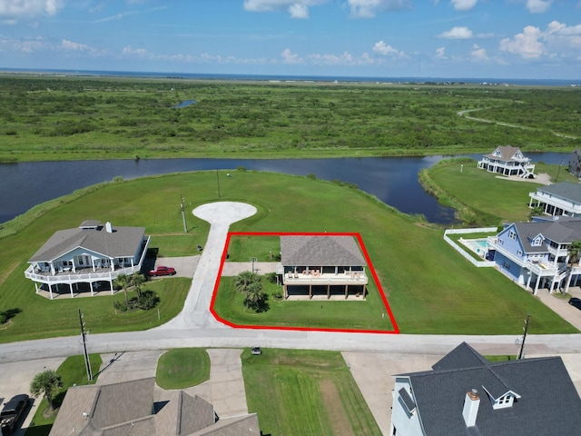 drone / aerial view featuring a water view