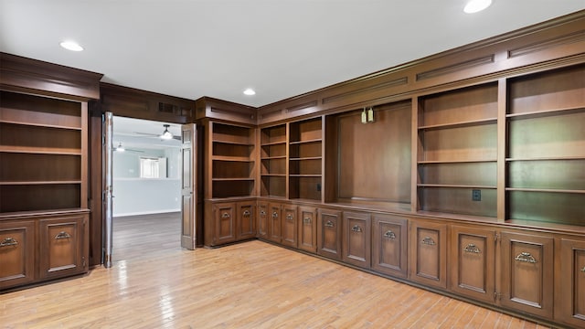 unfurnished office featuring light hardwood / wood-style floors