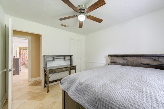 bedroom featuring light tile patterned floors and ceiling fan