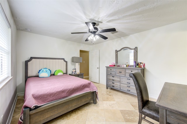 bedroom featuring ceiling fan