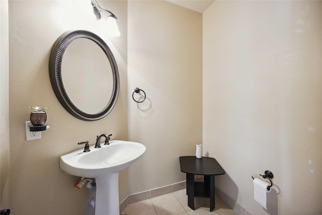 bathroom with tile patterned floors