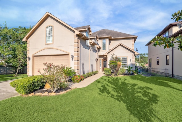 view of front of house with a garage and a front lawn