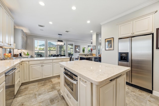 kitchen with crown molding, a kitchen island, kitchen peninsula, hanging light fixtures, and appliances with stainless steel finishes