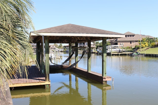 dock area featuring a water view