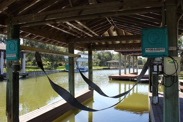 view of dock with a water view