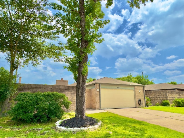 single story home featuring a garage