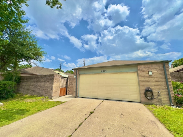 exterior space with an outbuilding and a garage