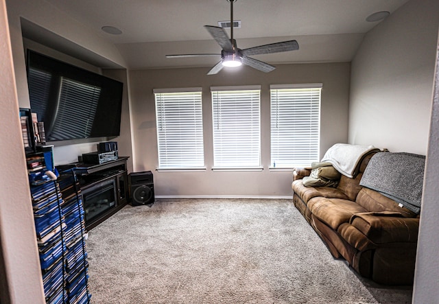 sitting room featuring carpet, lofted ceiling, and ceiling fan