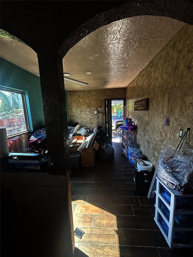 interior space with a textured ceiling