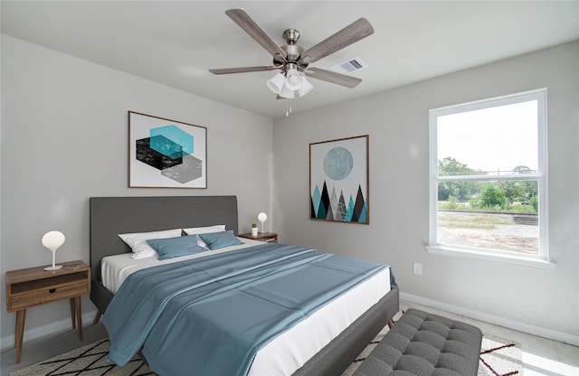 carpeted bedroom featuring ceiling fan and multiple windows