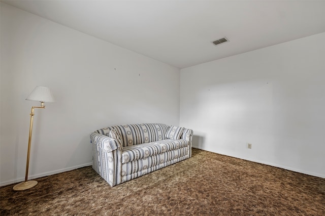 living area with carpet flooring