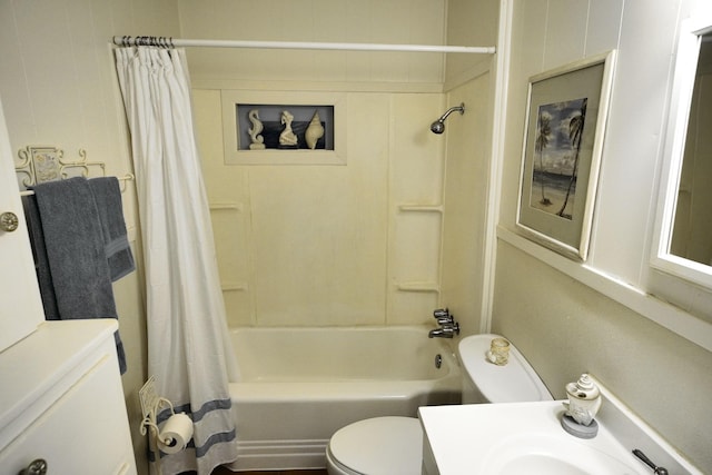 full bathroom featuring vanity, toilet, and shower / bath combo with shower curtain