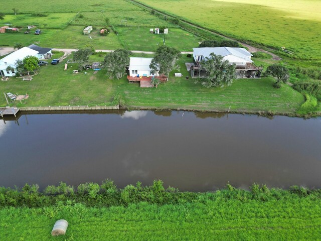 aerial view featuring a water view and a rural view