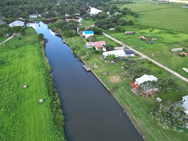 aerial view with a water view and a rural view