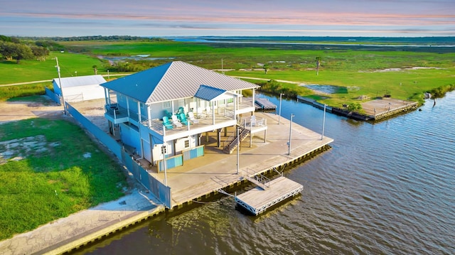 4850 County Road 328, Vanderbilt, TX 77969 - aerial view at dusk with a water view