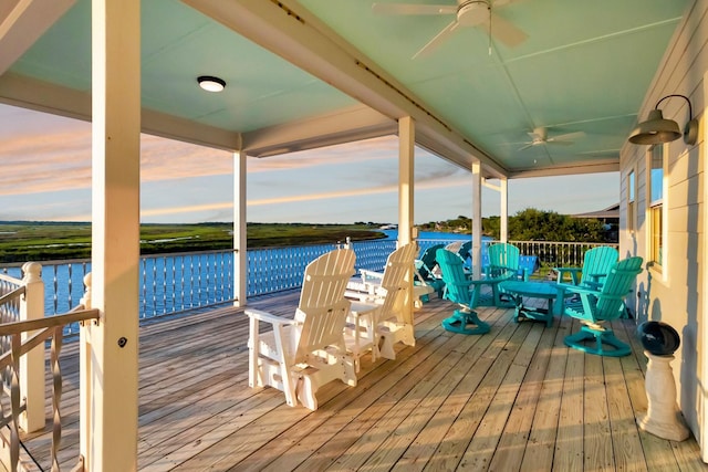 4850 County Road 328, Vanderbilt, TX 77969 - wooden deck featuring a water view and ceiling fan