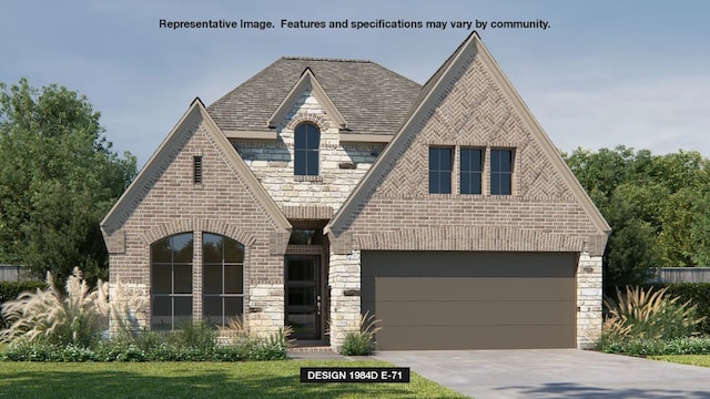 view of front of home with a garage and a front yard