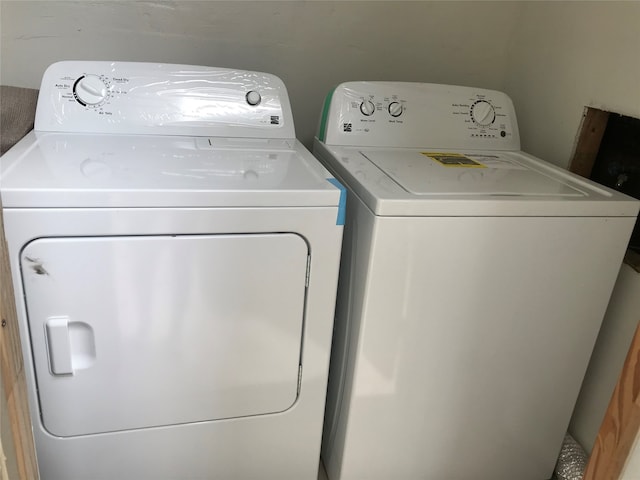 laundry area featuring independent washer and dryer