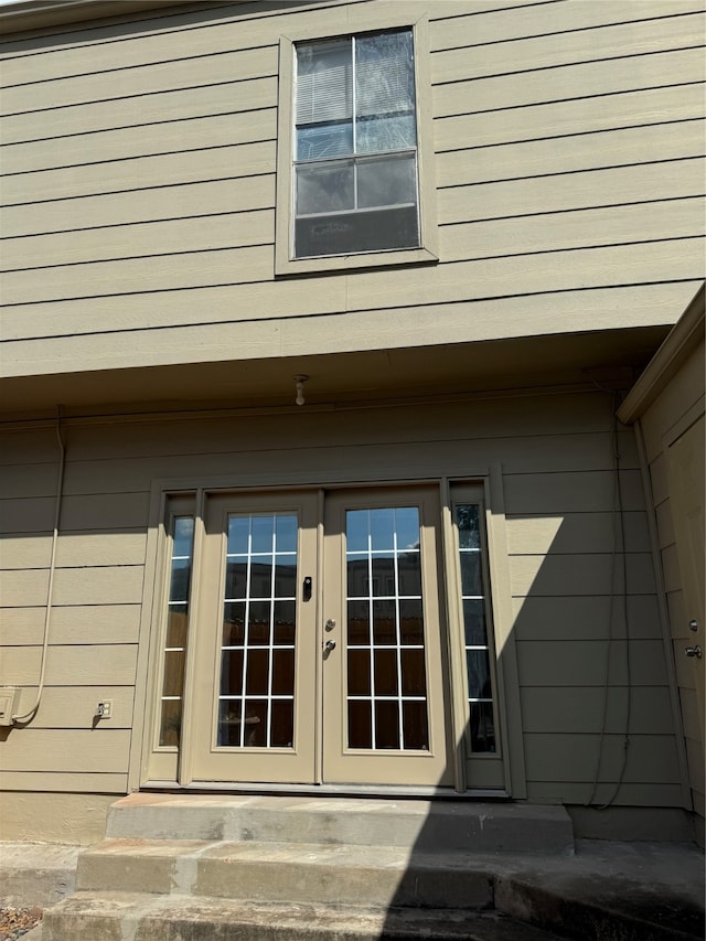 property entrance featuring french doors