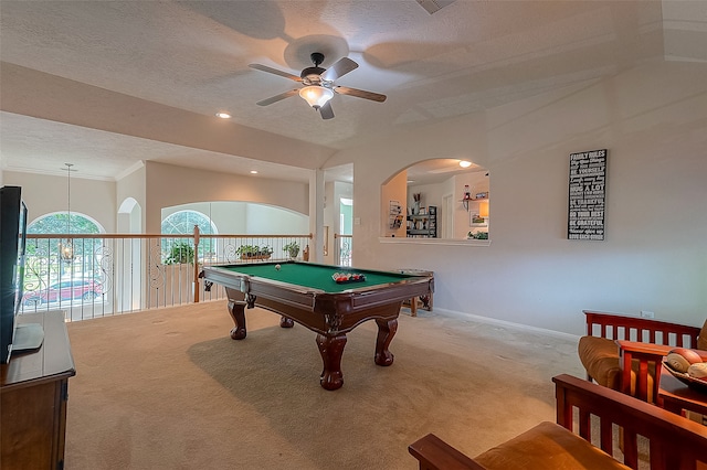 rec room with carpet flooring, ceiling fan, billiards, and a textured ceiling