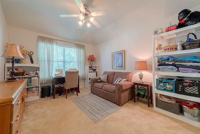 interior space with ceiling fan and light carpet