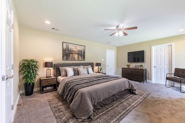 bedroom with ceiling fan and carpet