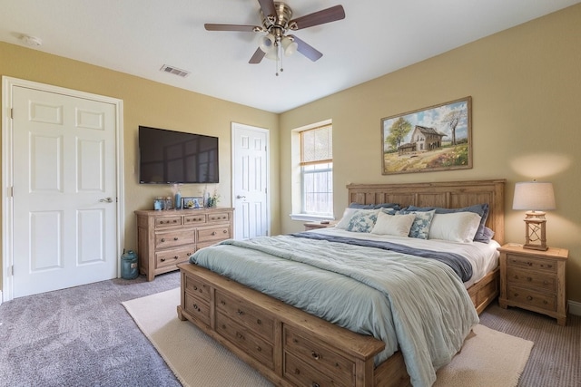 carpeted bedroom with ceiling fan