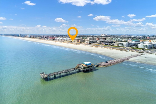 bird's eye view with a beach view and a water view