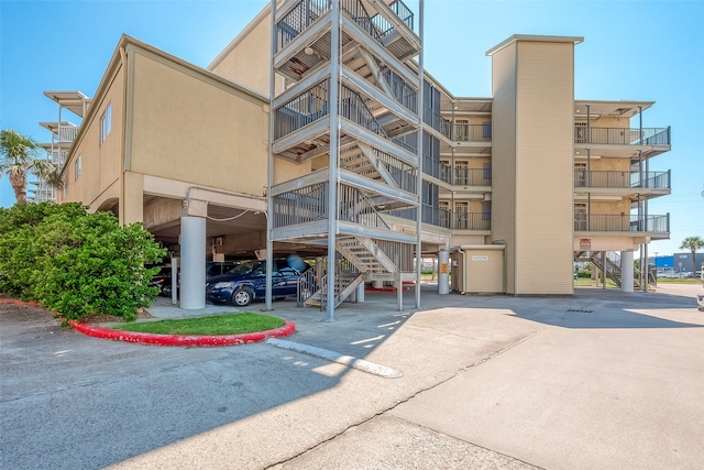 view of building exterior featuring a carport