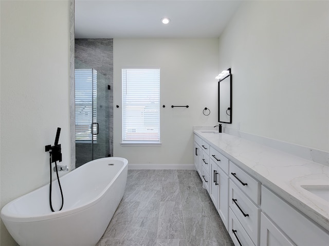 bathroom featuring vanity, shower with separate bathtub, and hardwood / wood-style flooring