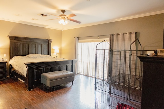 bedroom featuring crown molding, ceiling fan, and hardwood / wood-style flooring