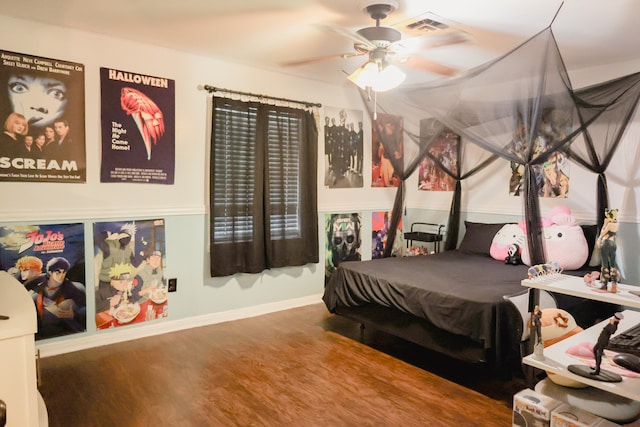 bedroom featuring wood-type flooring and ceiling fan