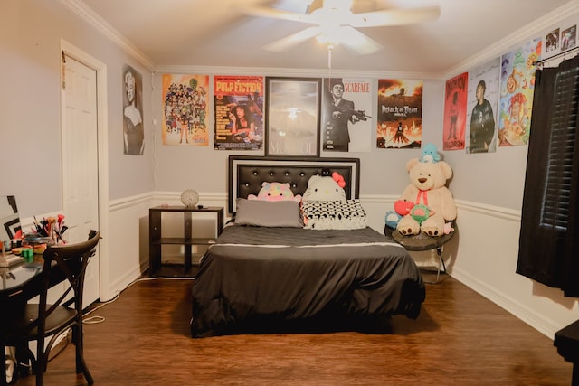 bedroom featuring ornamental molding, ceiling fan, and dark hardwood / wood-style floors