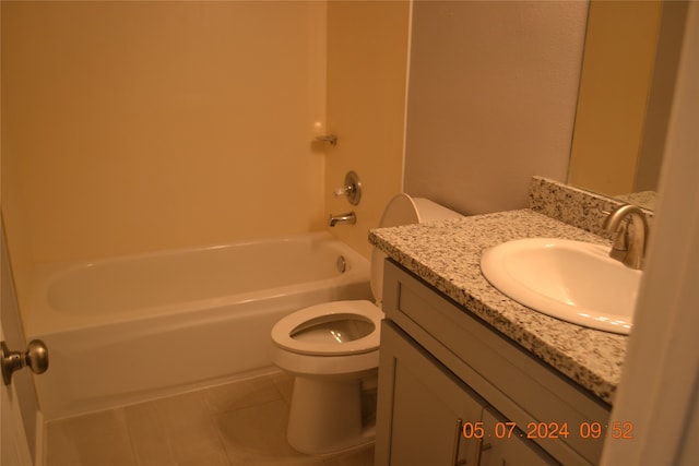 full bathroom with vanity, toilet, washtub / shower combination, and tile patterned floors