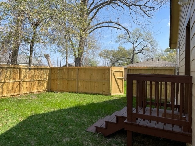 view of yard with a deck