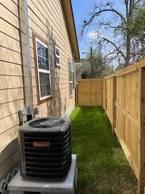 view of yard featuring central AC