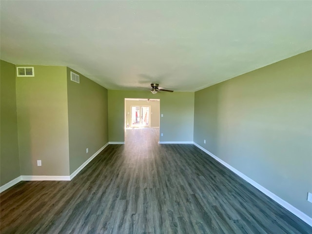 empty room featuring ceiling fan and hardwood / wood-style floors