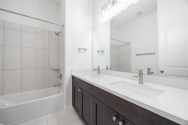 full bathroom featuring a sink, shower / tub combination, double vanity, and tile patterned floors