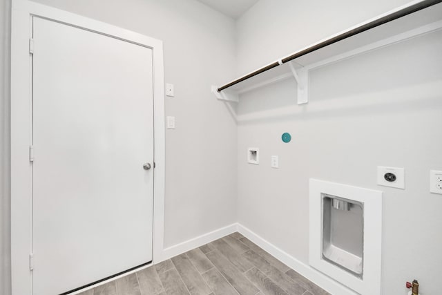 washroom featuring baseboards, wood tiled floor, washer hookup, laundry area, and electric dryer hookup