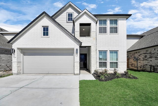 view of front of property with a front yard, concrete driveway, and brick siding