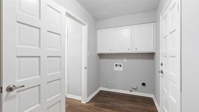 laundry area featuring cabinets, dark hardwood / wood-style floors, and hookup for a washing machine