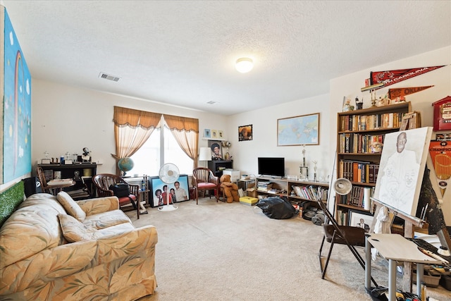 carpeted living room featuring a textured ceiling and visible vents