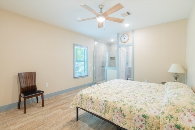 bedroom with light hardwood / wood-style floors and ceiling fan