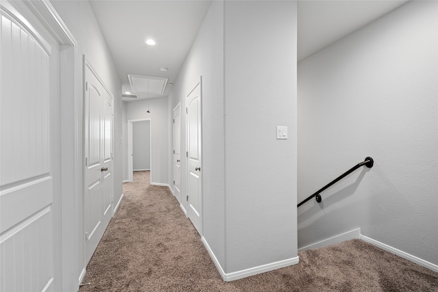 corridor with light colored carpet